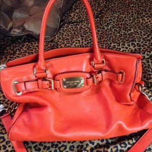 Red-orange Michale Kors purse