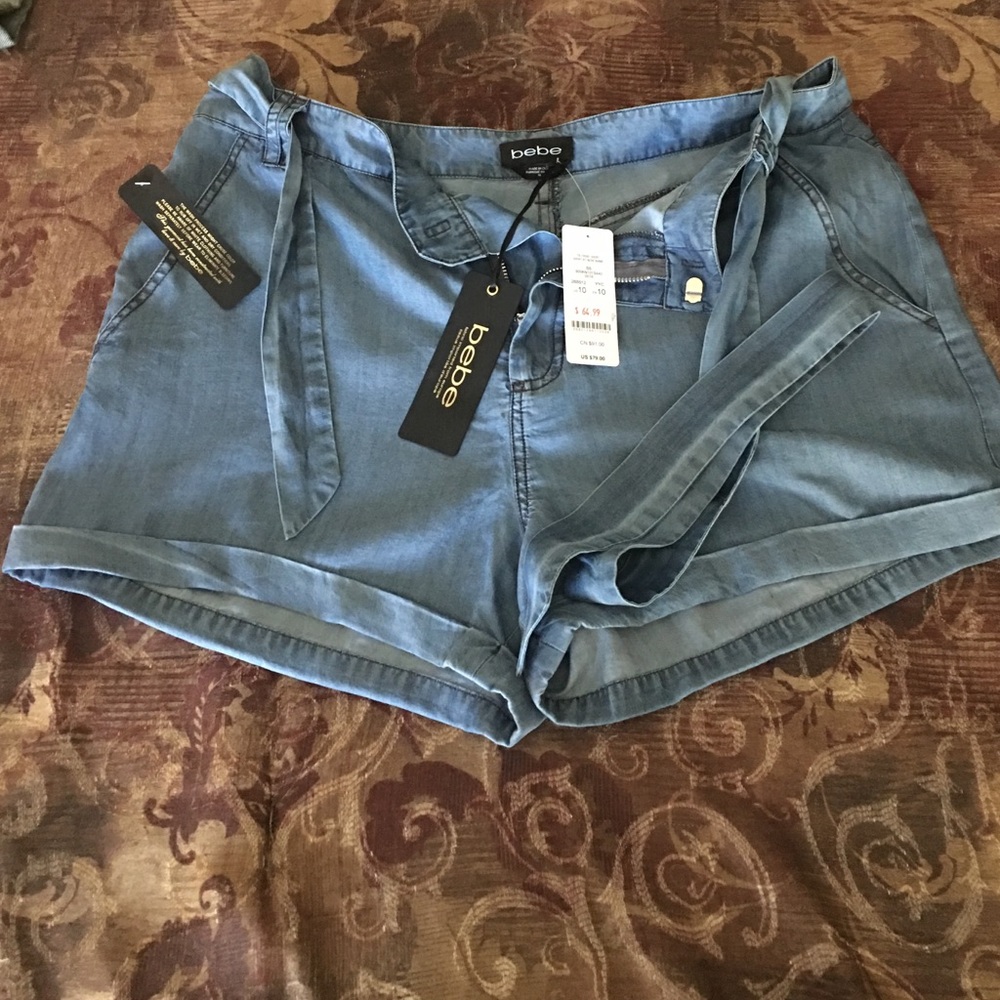 SOLD‼️‼️Soft blue denim shorts by Bebe nwt excellent cond.