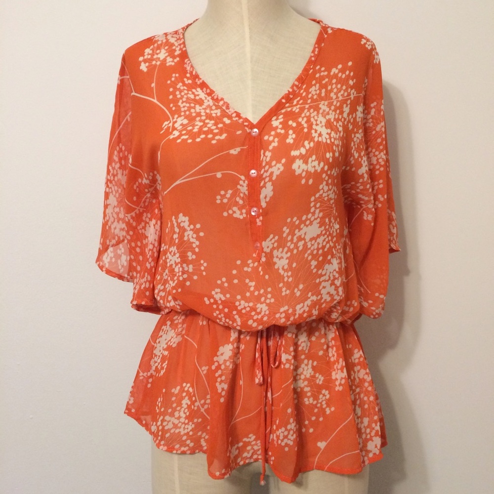 Sheer floral blouse with cinched waist