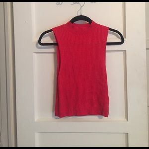 Red sleeveless turtleneck