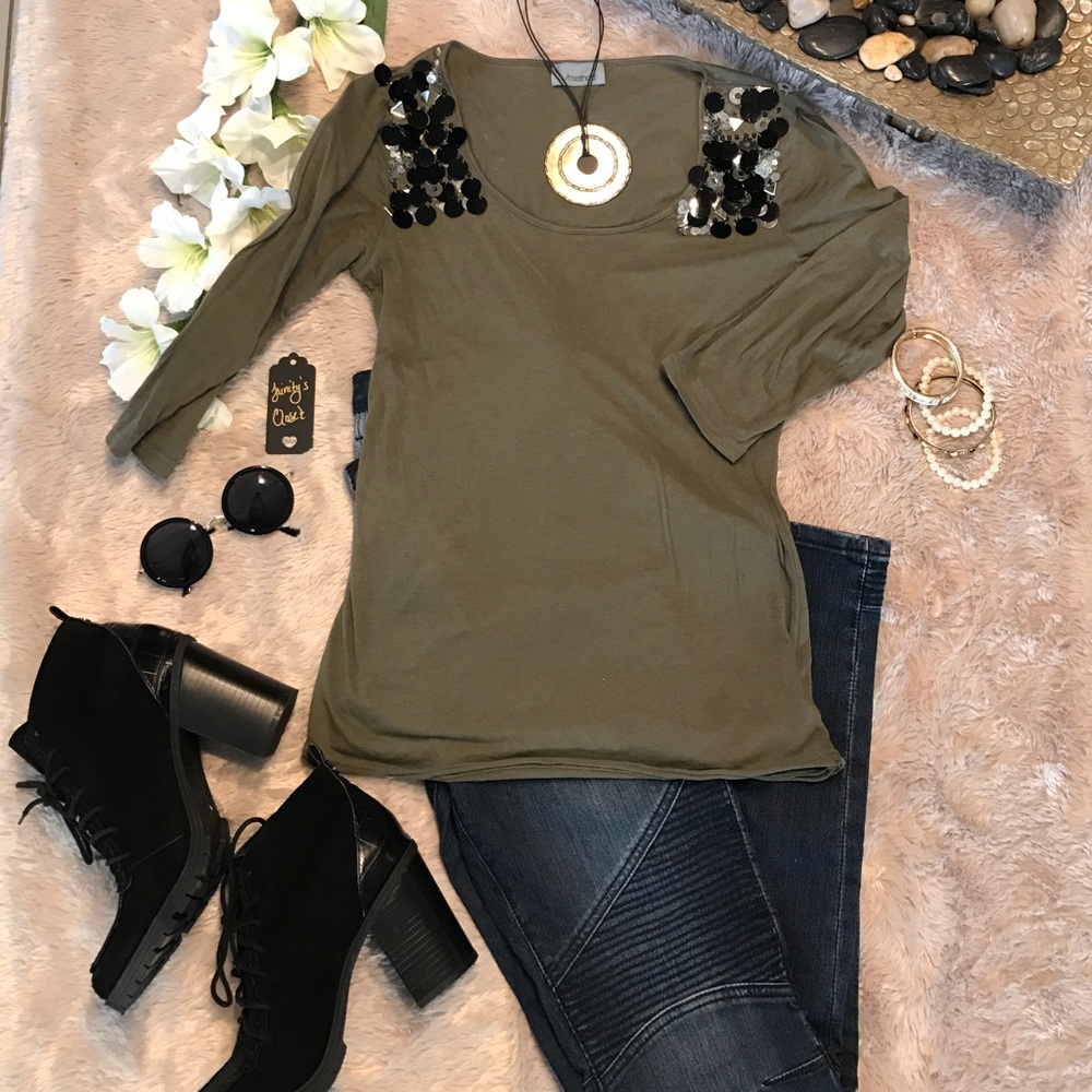 Army green top with black and silver embellishes