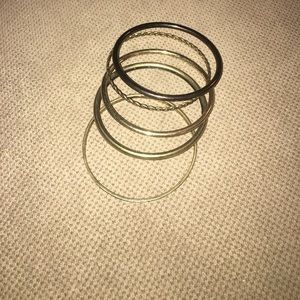 Gold bangle bracelets.