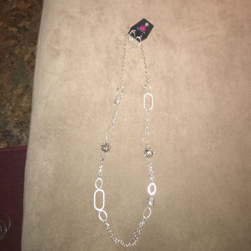 Matching necklace with earrings.