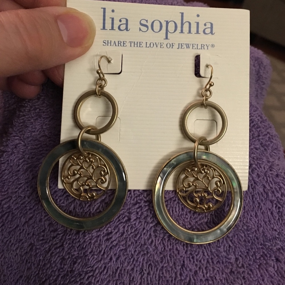 Gold and green dangle earrings