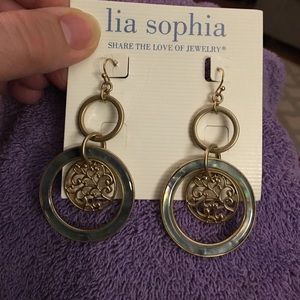 Gold and green dangle earrings