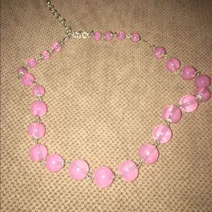 Pink glass ball necklace.