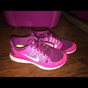 Pink and purple Nike free sneakers