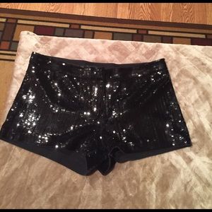 Black sequin shorts. Perfect for NYE !