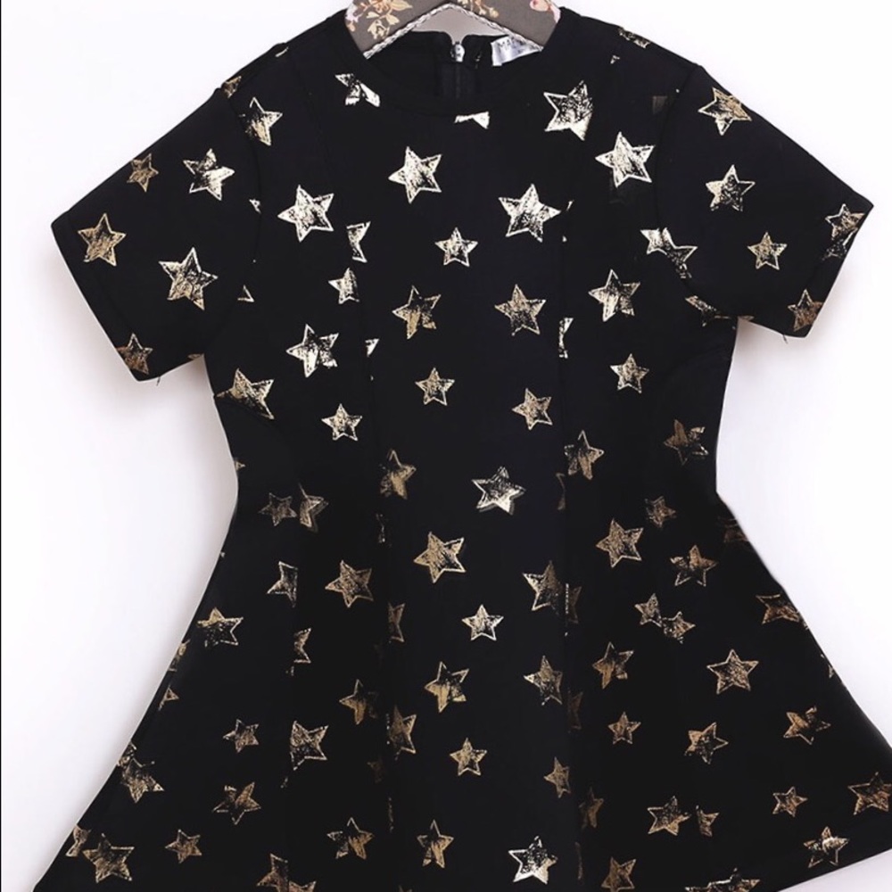 Girls dress by Mae Li Rose.