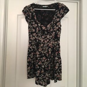 Kimchi Blue floral romper with buttons.