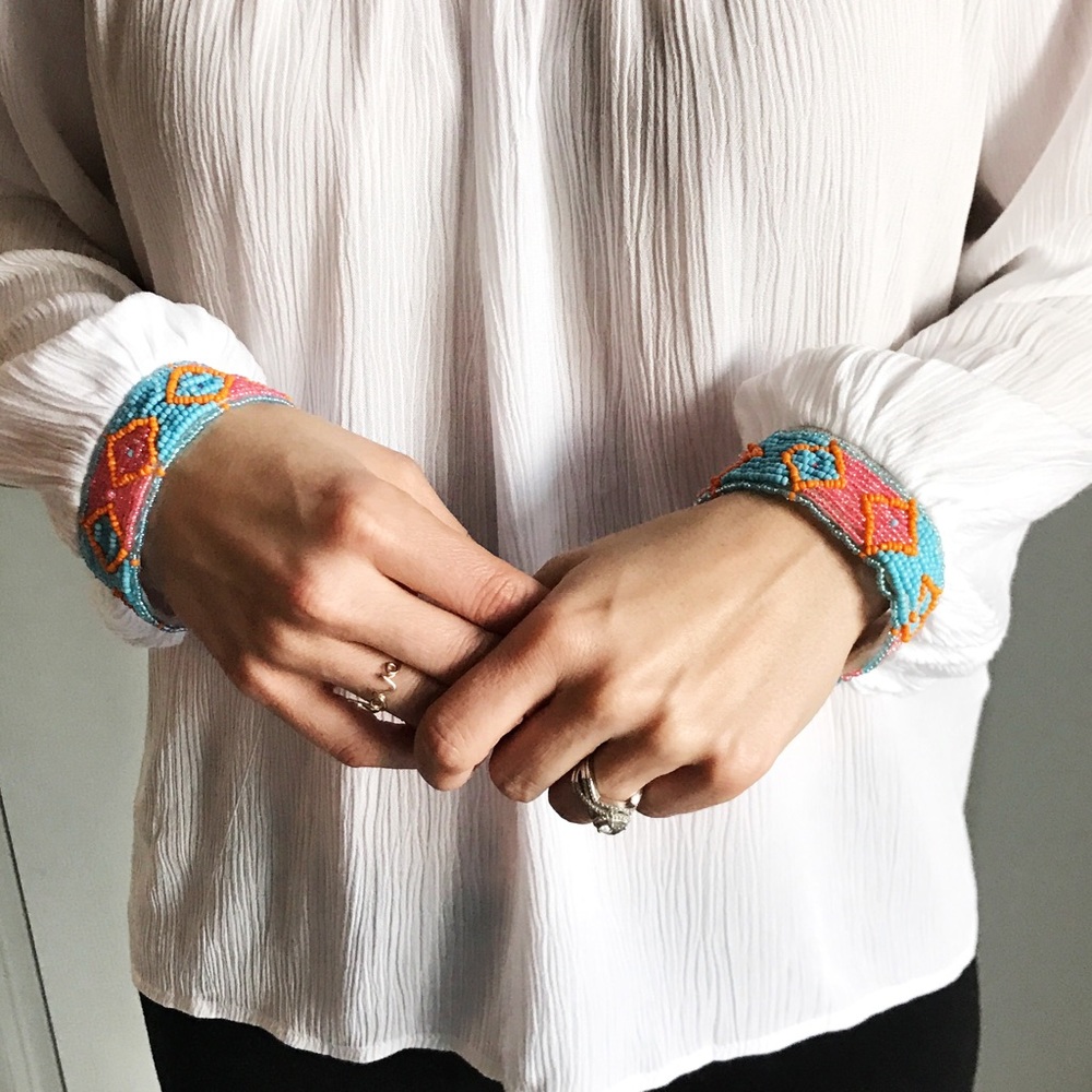 Beaded cuff white long sleeved top