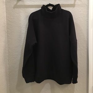 COS turtleneck sweater.