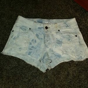 Tie dye distressed shorts