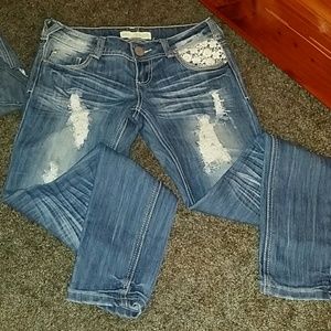 Distressed skinny jeans with lace detail