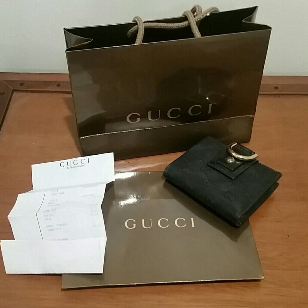 *SOLD* Gucci wallet with original reciept