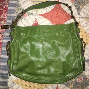 Green coach shoulder purse