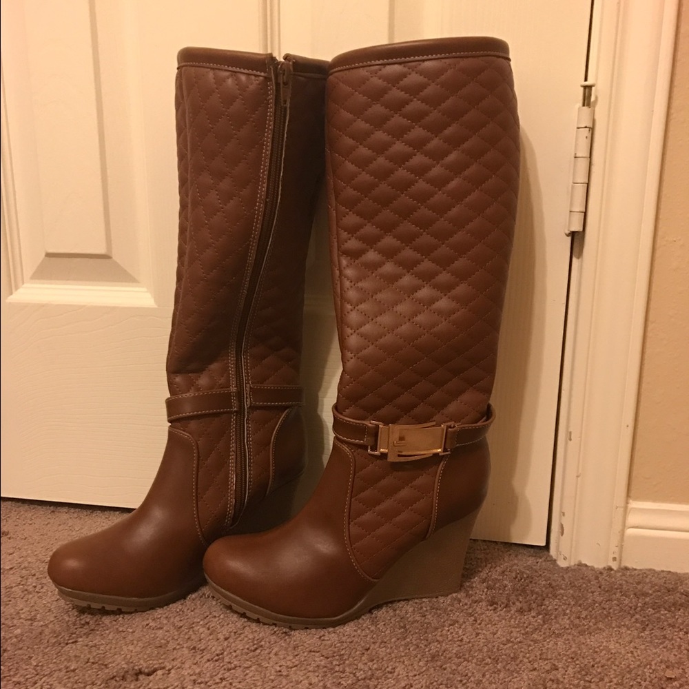 Brown Wedge boots.