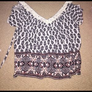 Flowy cold shoulder patterned top