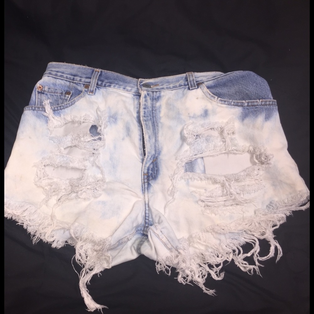 distressed Levi shorts.