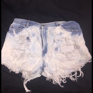 distressed Levi shorts.