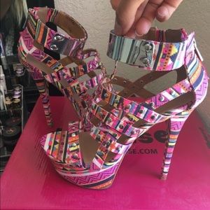 Pink strappy platform pumps