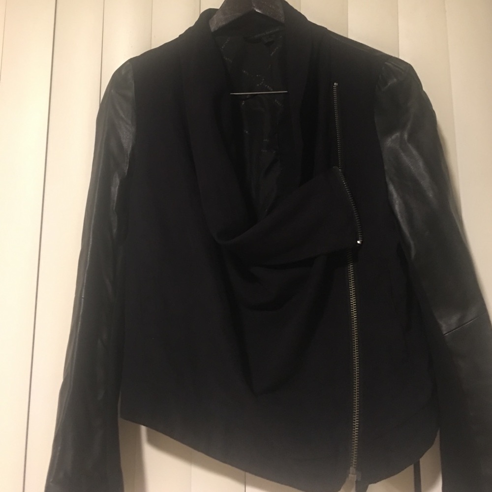 Jacket with leather sleeves