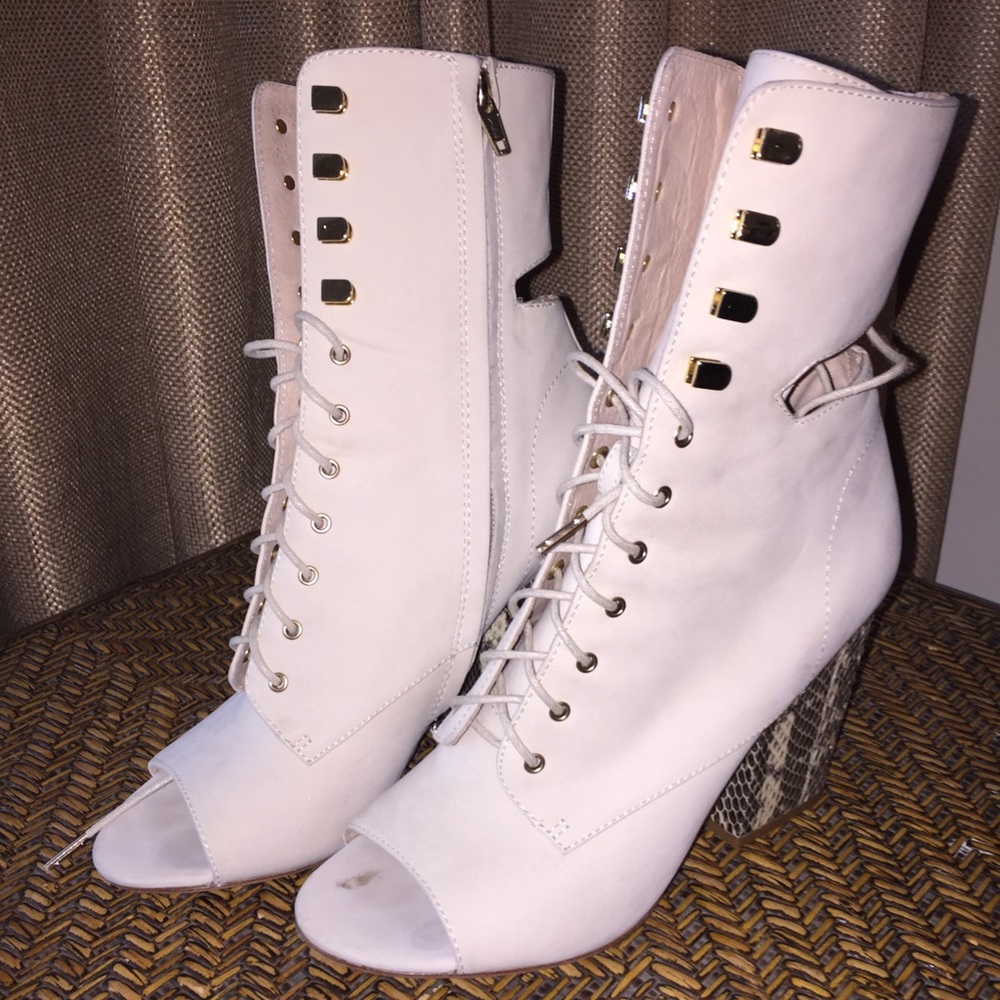 Cream suede block heeled booties.