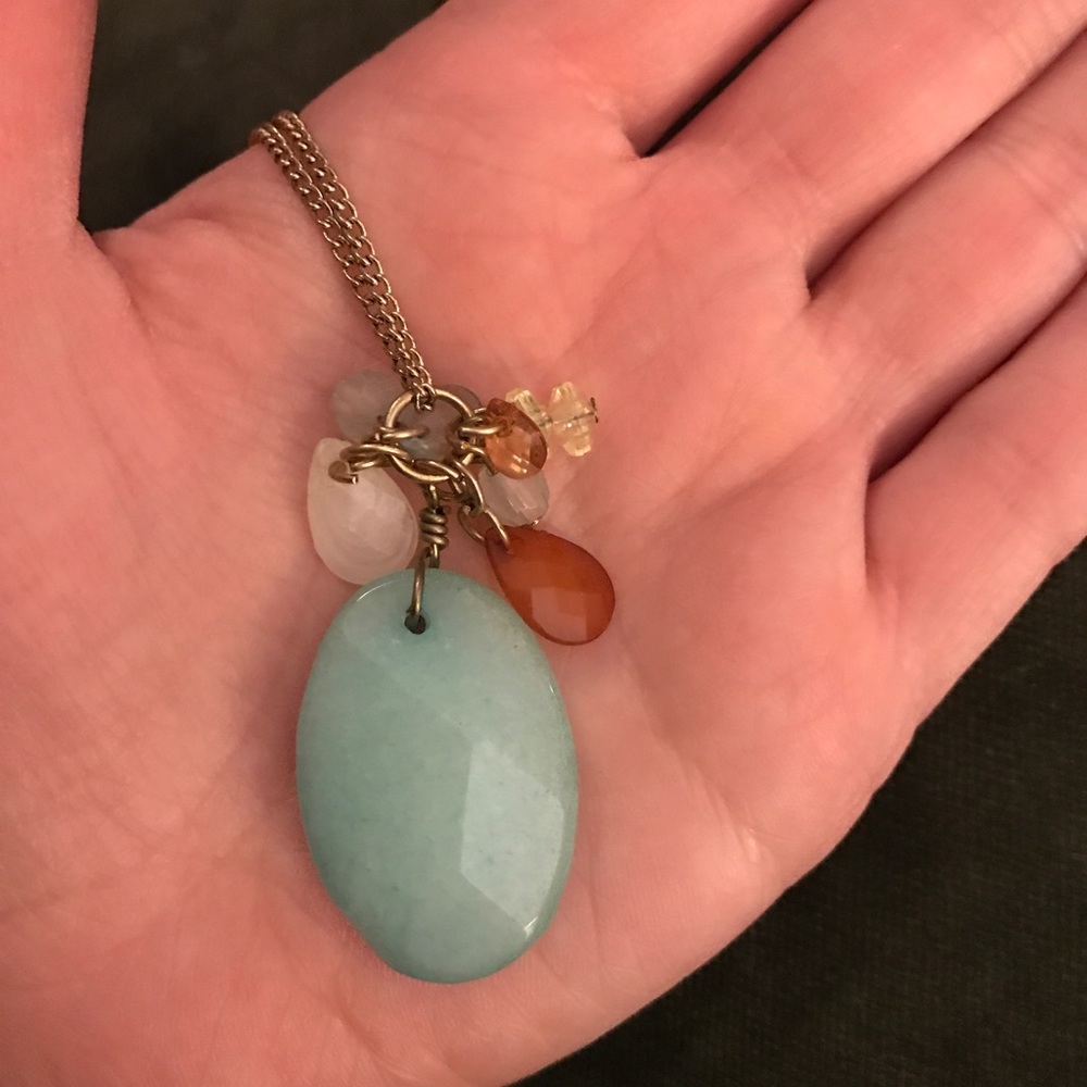 Gold necklace with turquoise pendant