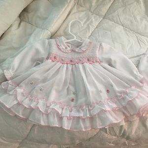 New without tags newborn dress and diaper cover.