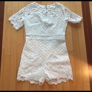White lacy romper. Never worn!