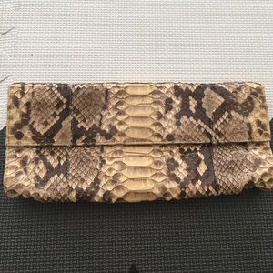 Cream python clutch