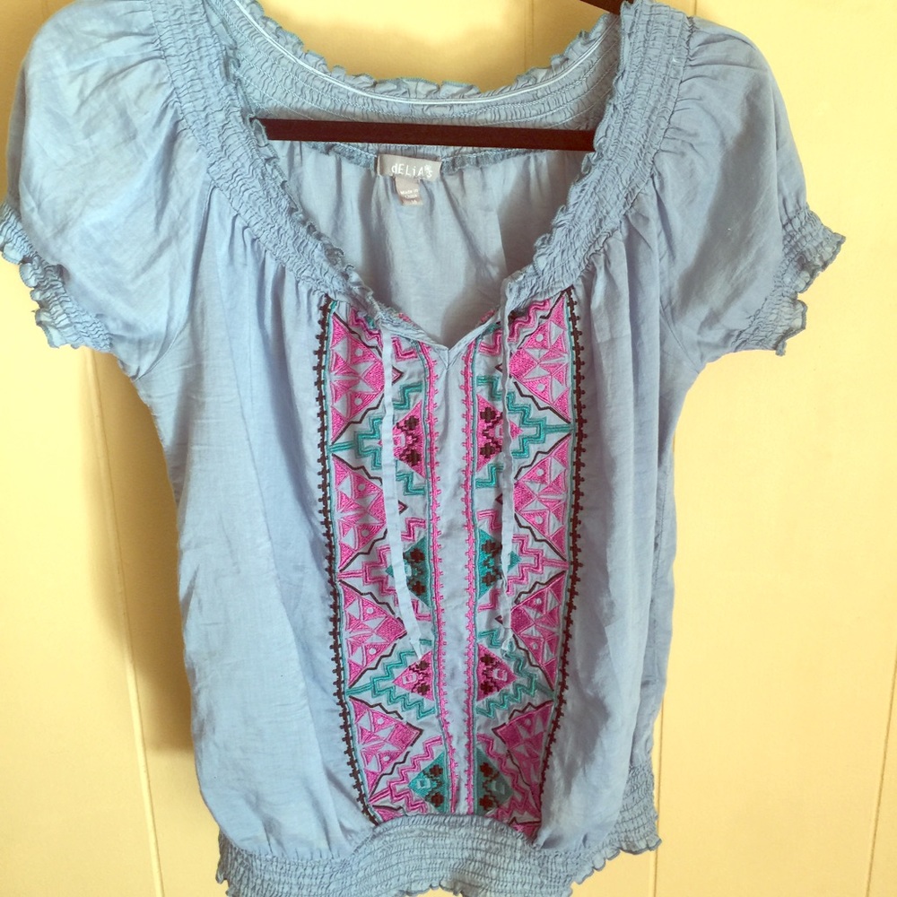 Cinch waist blue tribal print short sleeve blouse