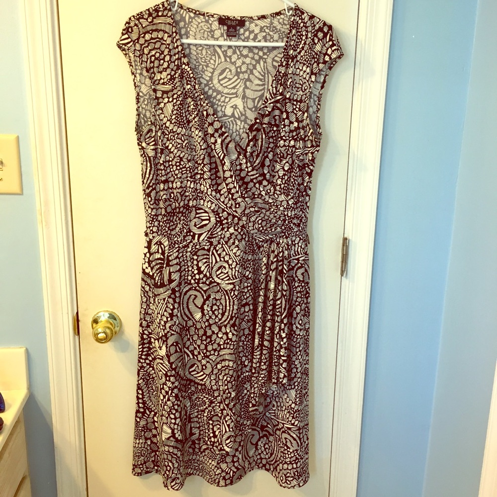 Beautiful flattering side sweep mock wrap dress!