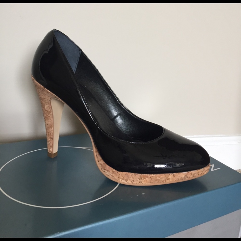 Nine West black patent pumps