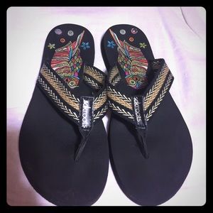 Sak Roots Black and Tan flip flops