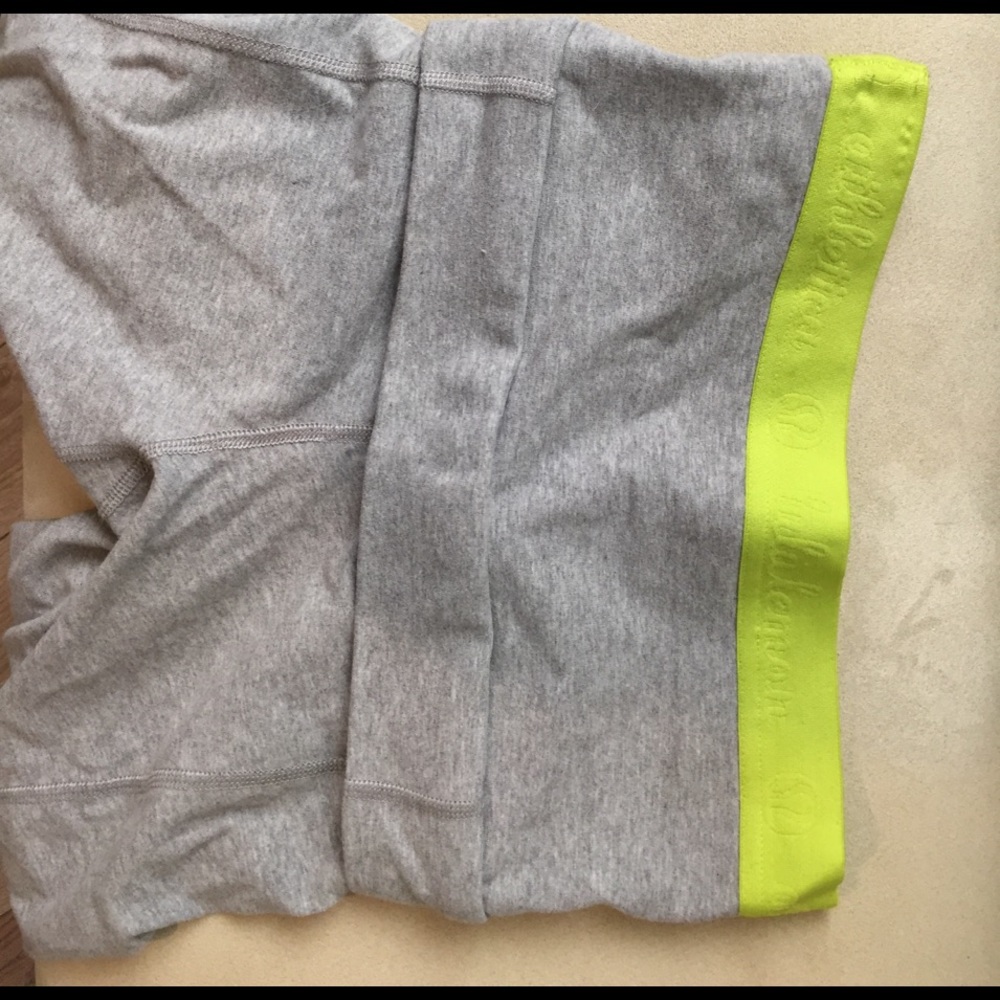 Lululemon size 4 grey and lime green yoga pants.