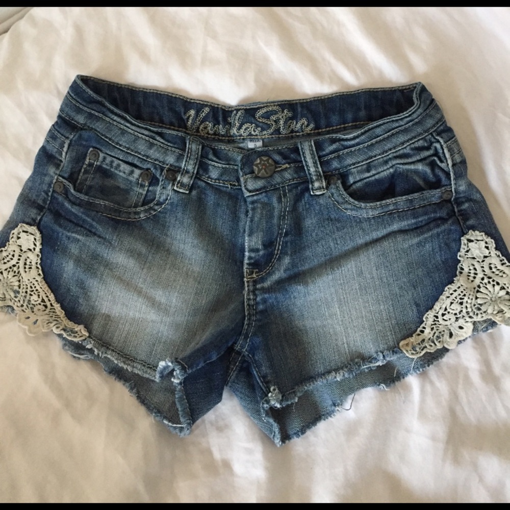 Distressed cutoff shorts with lace