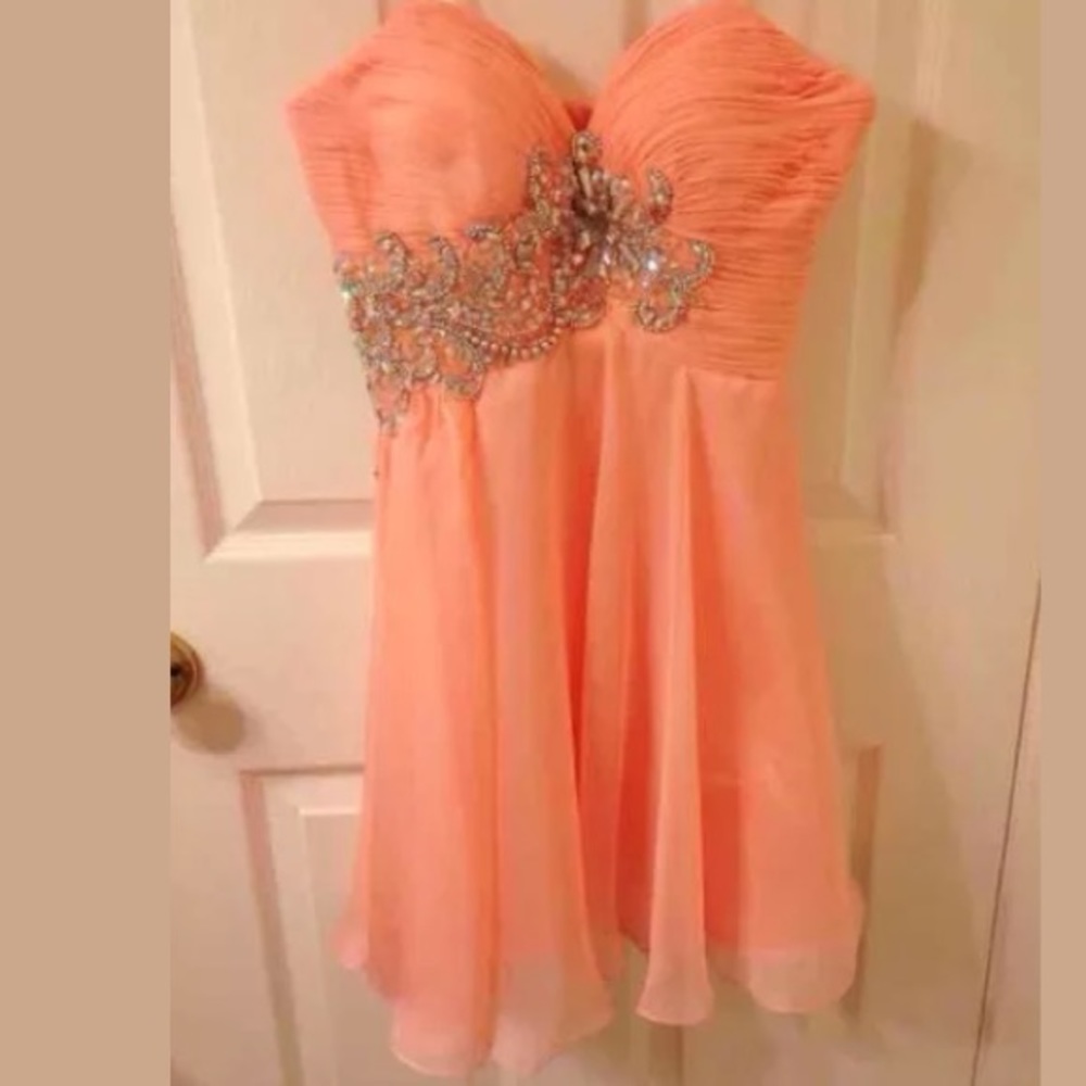 Strapless peach jeweled prom dress
