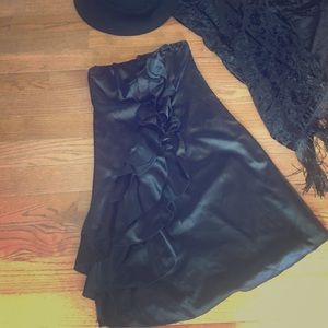 Strapless elegant dress with ruffle detail.