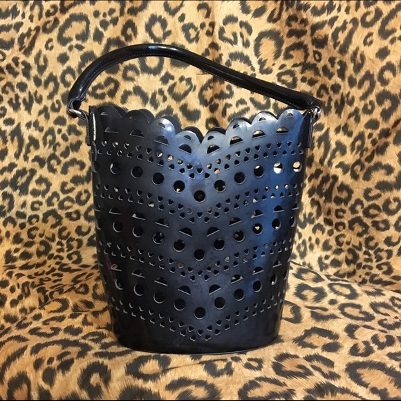 Neiman Marcus Handbags - 🎀DONATED🎀 Leather cut out bucket bag