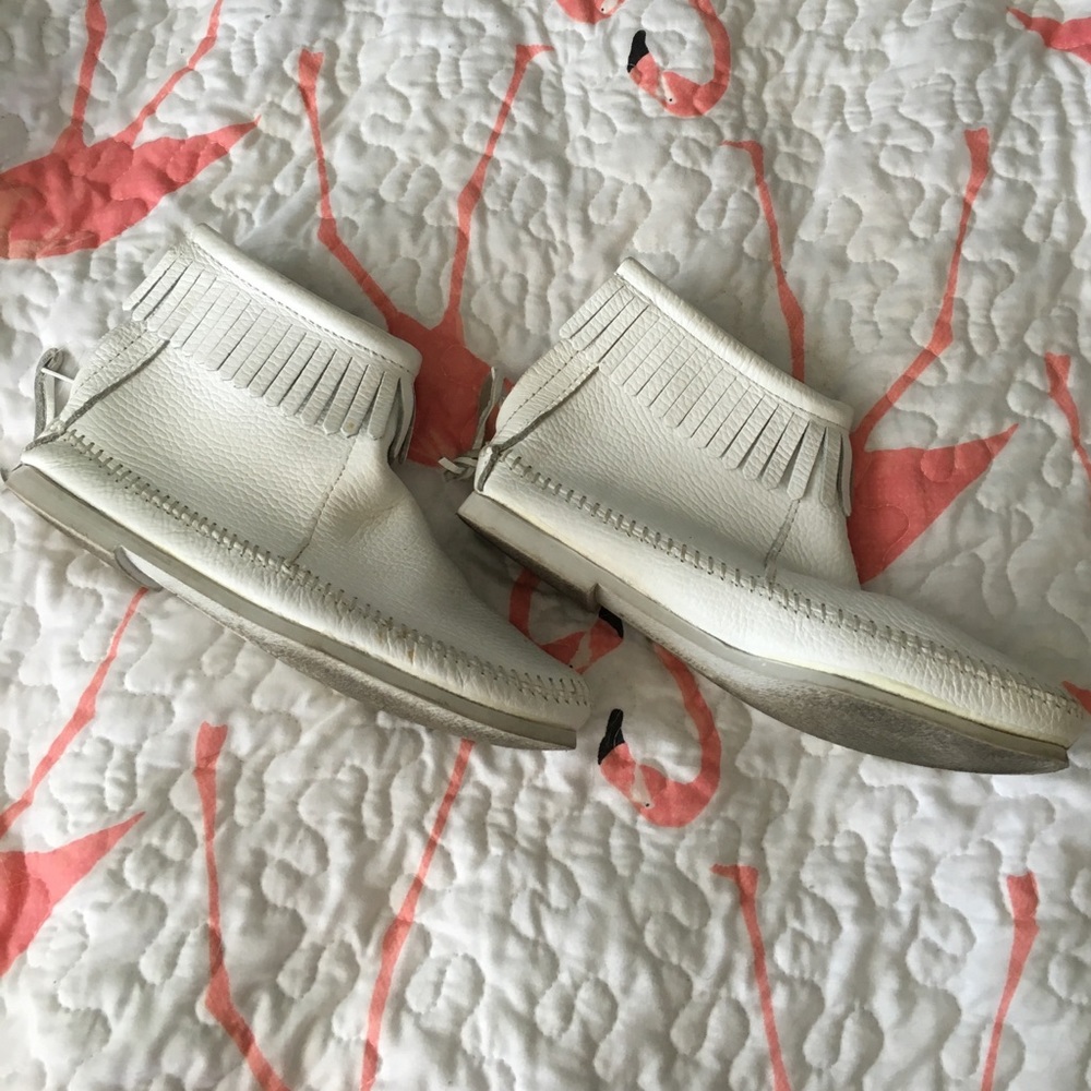 White leather Minnetonka fringe booties