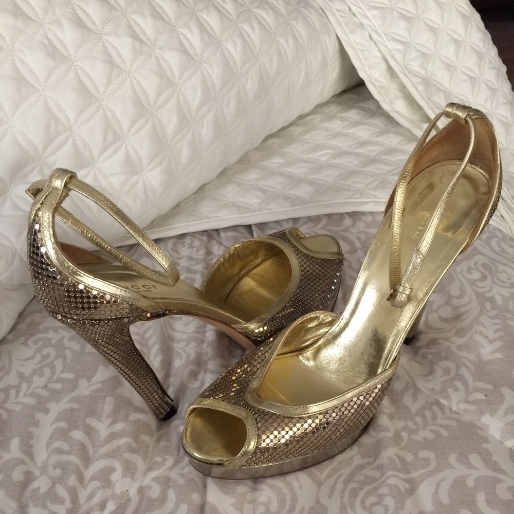 Authentic Gucci gold shimmer open toe shoes.