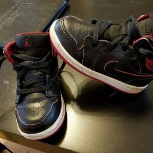 Black and red Air Jordans 7C