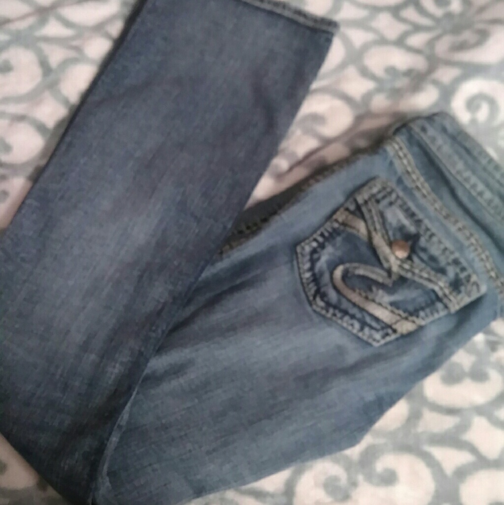 Silver boot cut jeans.
