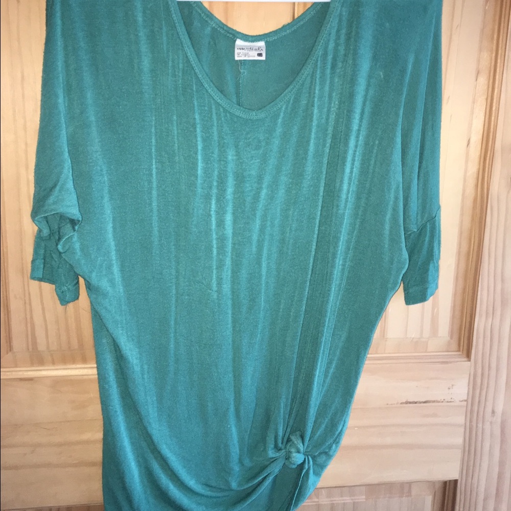 Blue/green top.