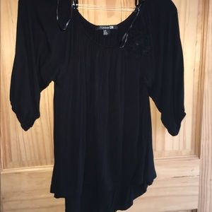 Blouses with flower pin.