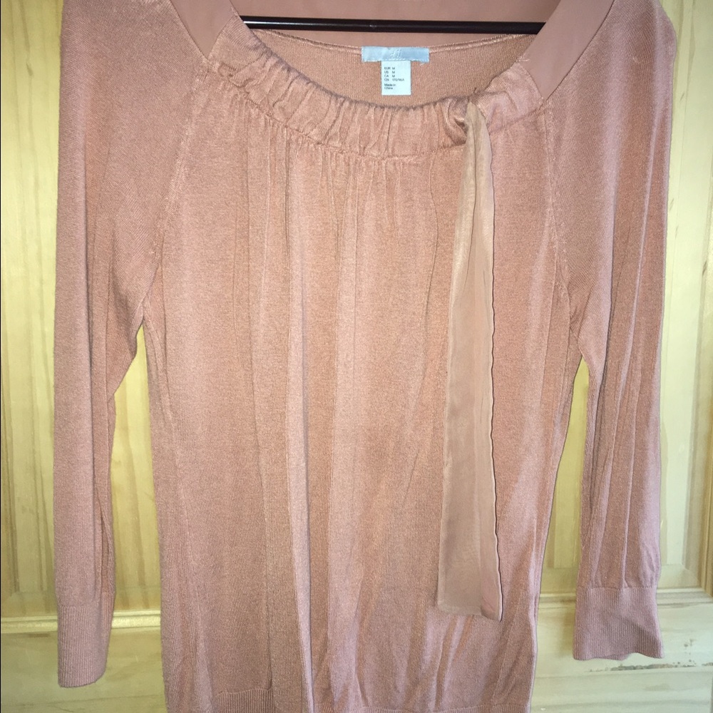 Pink blouse.