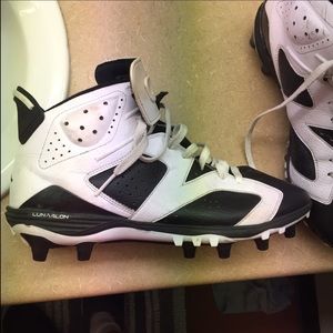Black and white Jordan's cleats