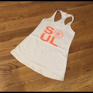 White and orange Lululemon/SoulCycle top
