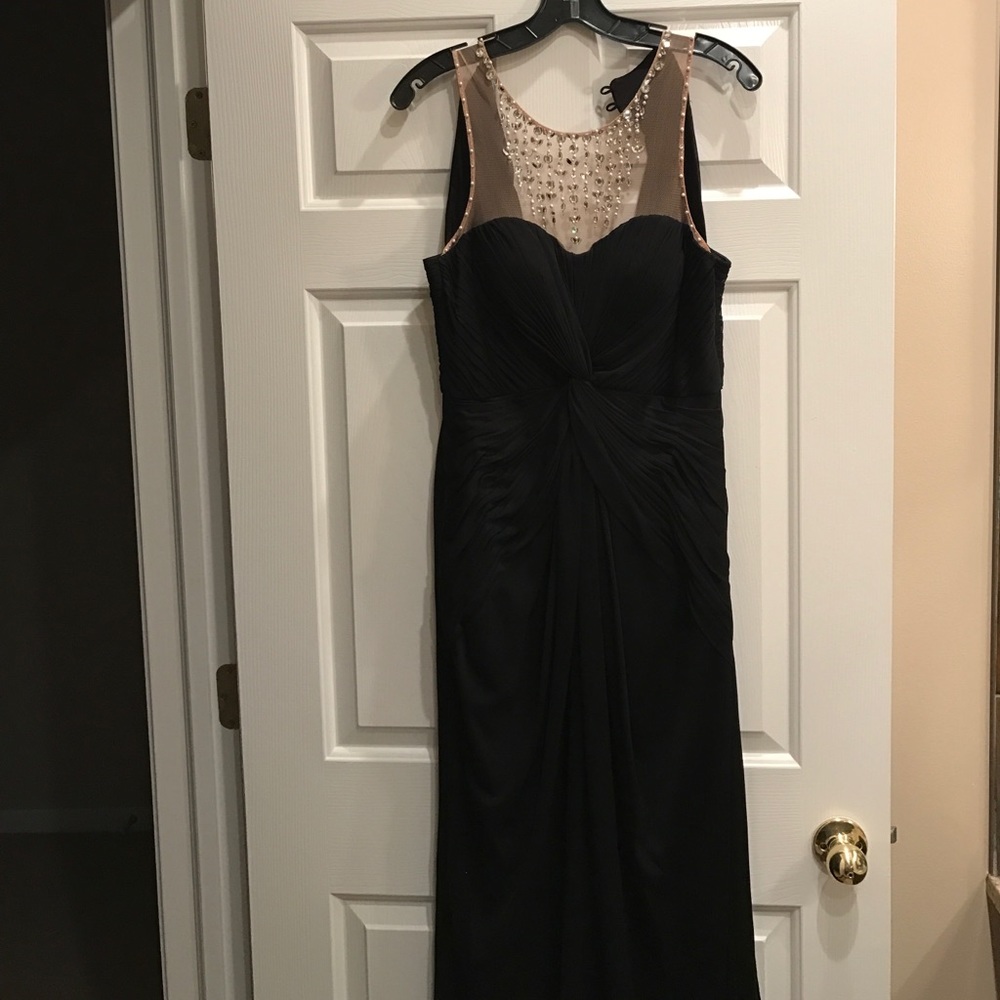 Long black dress by Adriana Papel